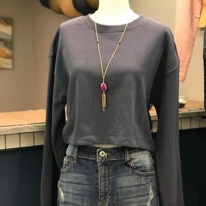 Blue crop sweater. Open back. Tie close.